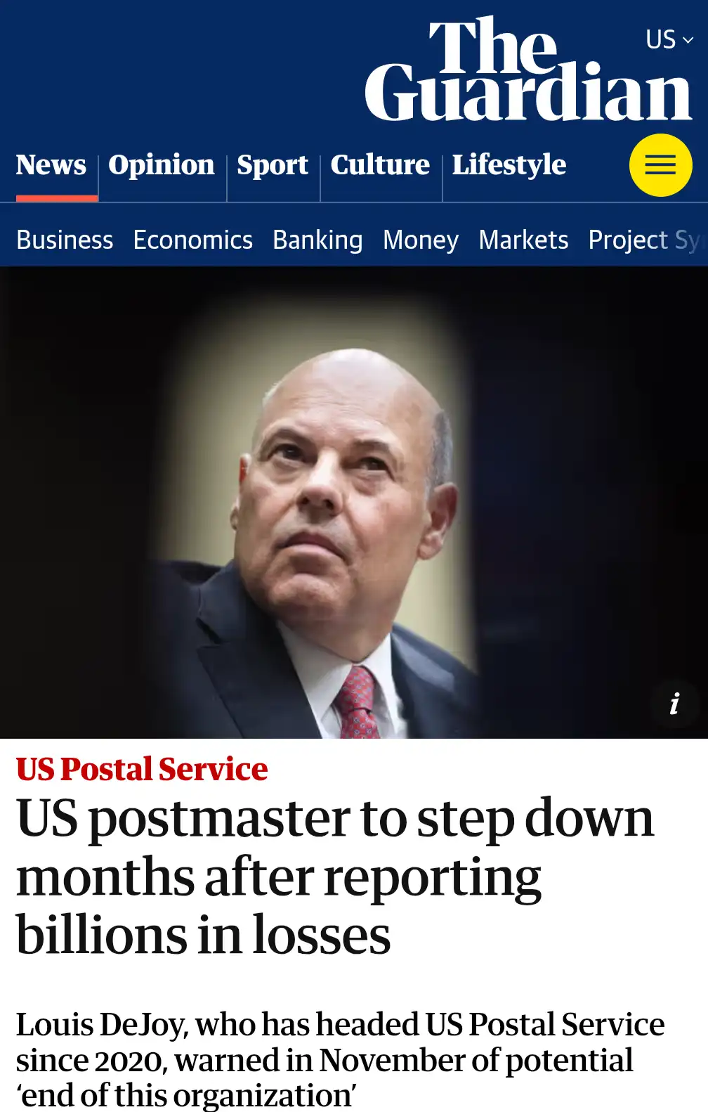 A screenshot of The Guardian's news article featuring a photo of Louis DeJoy, the former US Postmaster General, looking…