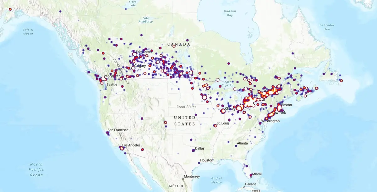 A map of North America showing scattered red and blue dots across the United States and Canada, with major cities labeled…