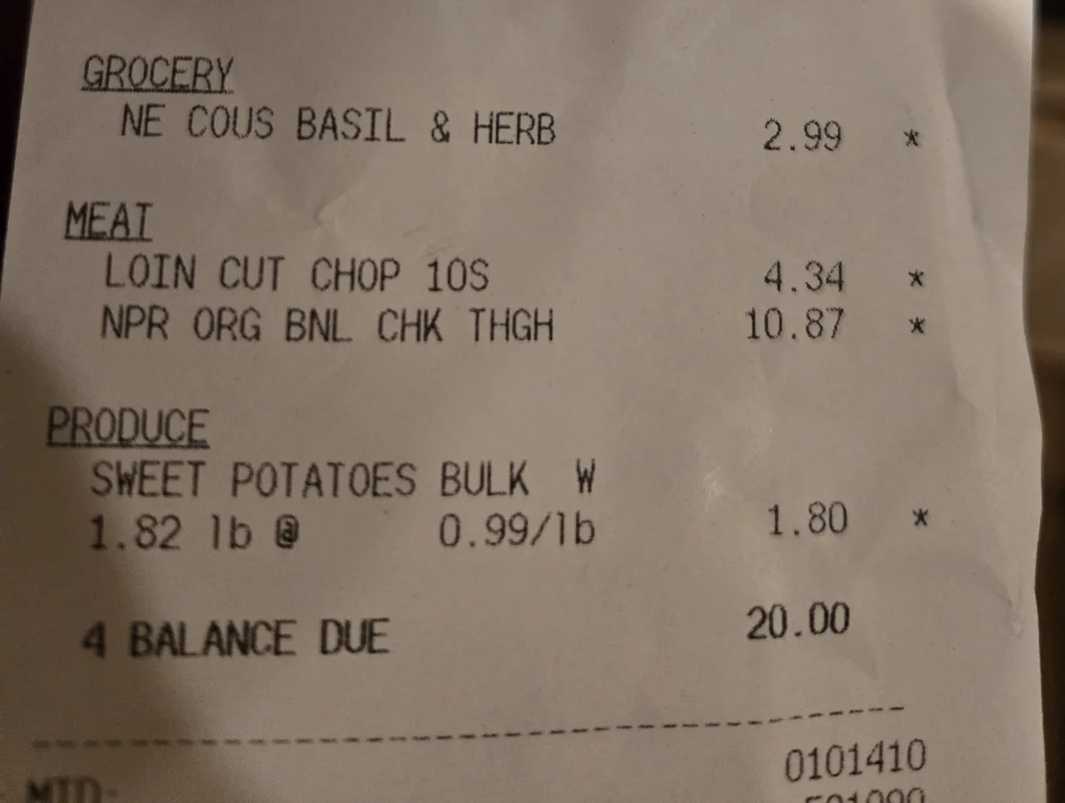 A close-up of a grocery receipt showing items like 'NE COUS BASIL & HERB', 'LOIN CUT CHOP 10S', and 'SWEET POTATOES BULK'…