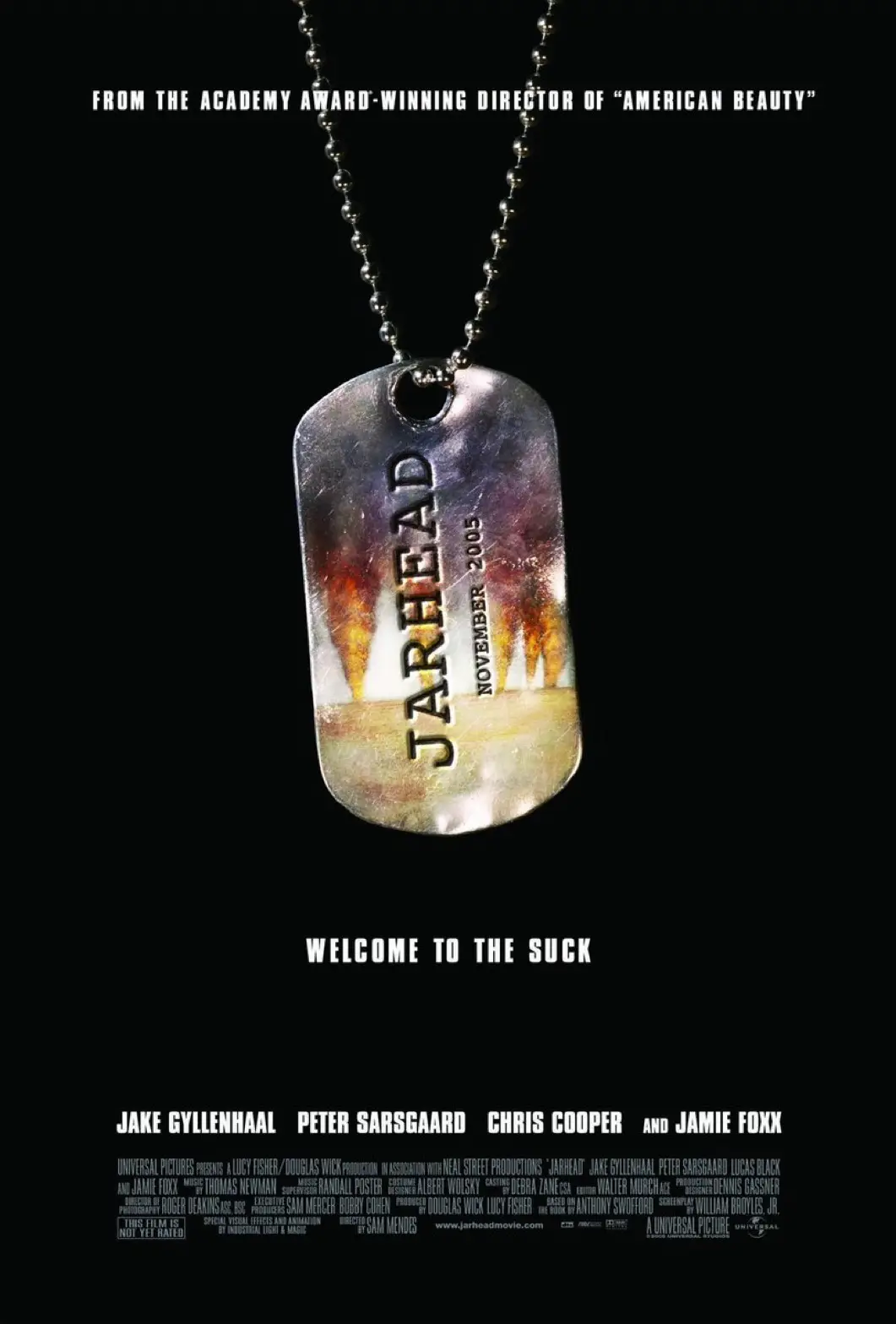 A movie poster for 'Jarhead' shows a dog tag on a chain against a black background. The tag has 'JARHEAD' and 'NOVEMBER…