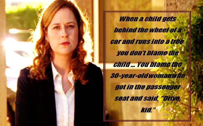 A woman with wavy brown hair, wearing a white shirt and black blazer, looks concerned while standing outdoors. Overlaid text…