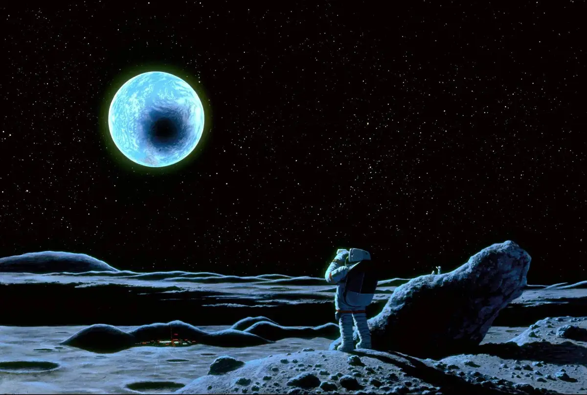 An astronaut stands on a barren, rocky moon-like surface, gazing up at a large, glowing blue planet that has a black hole at…