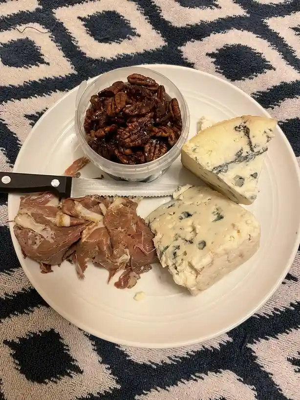 A Festive Feast: Christmas Eve Delights with Blue Cheese, Caramelized Pecans, and Duck Prosciutto