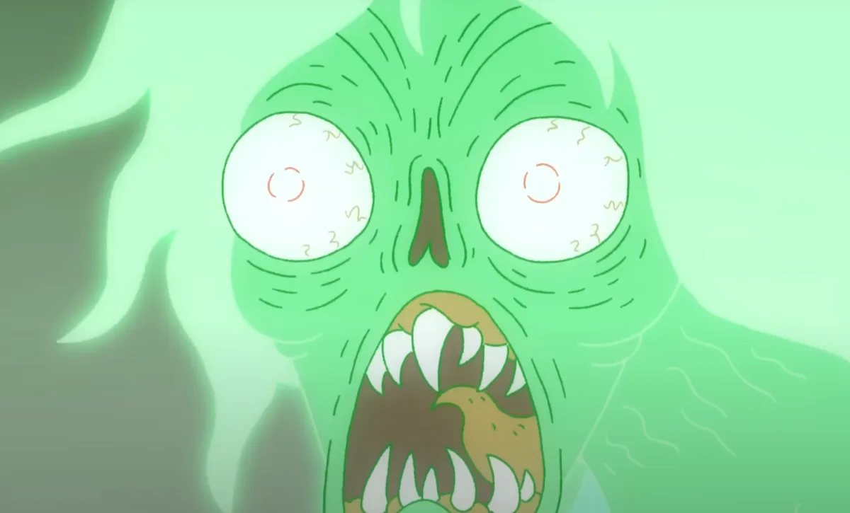 A green, cartoonish monster with wide, white eyes and sharp teeth is screaming in terror, surrounded by glowing green…