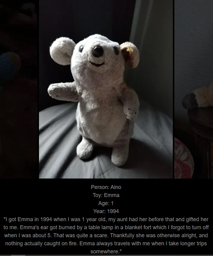 A worn, white stuffed koala toy named Emma sits upright on a bed, one ear visibly scorched and discolored. Below the image…