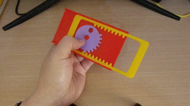 A hand repeatedly presses a purple gear button inside a red and yellow plastic toy device, shown in a sequence of six…