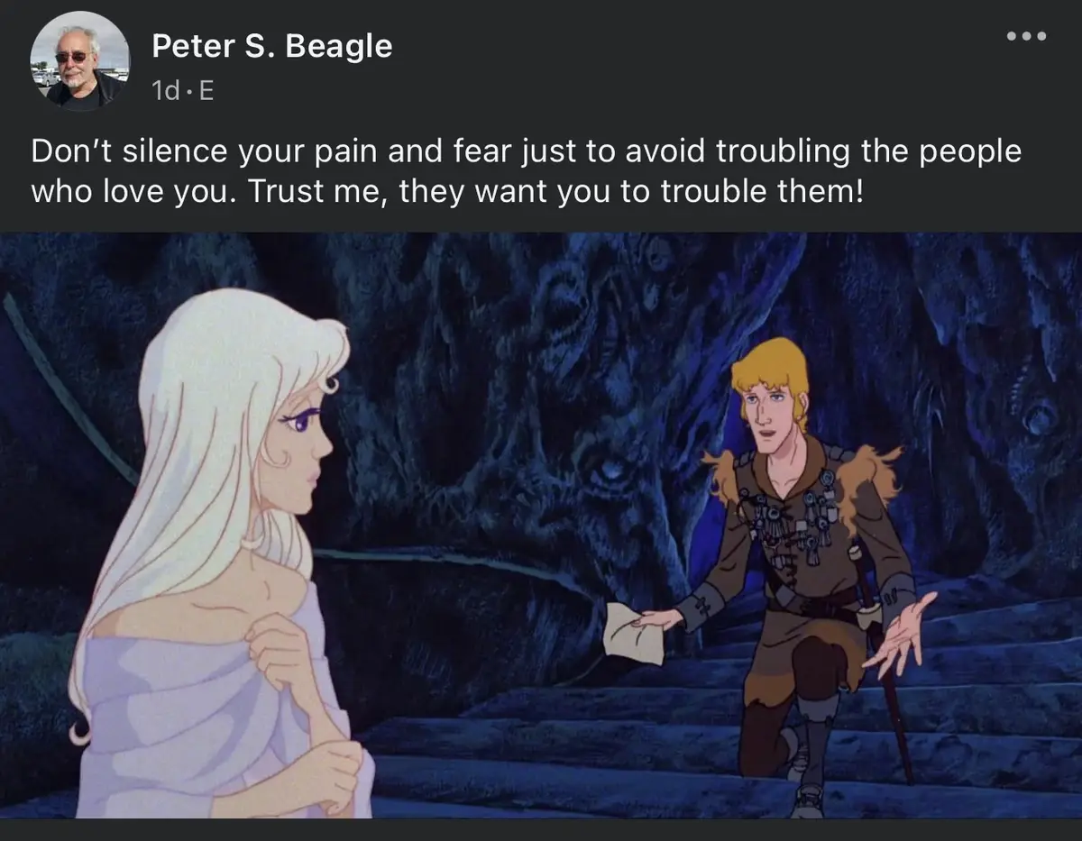 An animated scene from 'The Last Unicorn' shows a man kneeling and offering a letter to a woman in a white dress, with a…