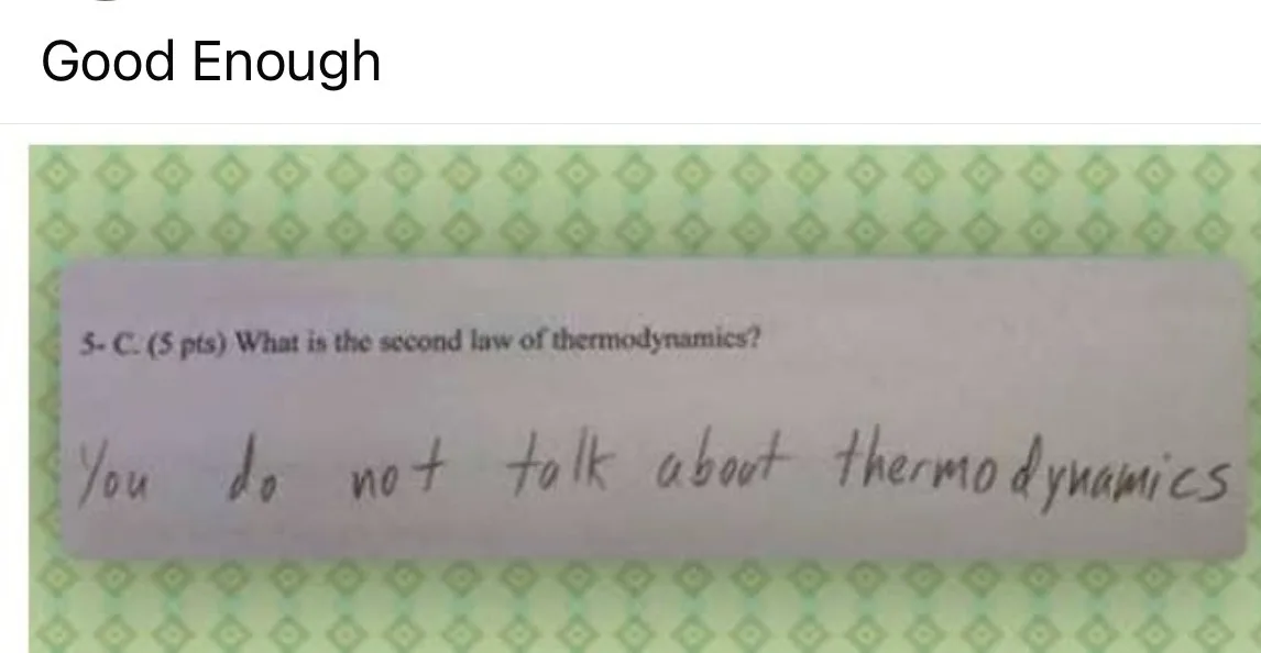 A close-up of a handwritten answer on a test paper, responding to the question 'What is the second law of thermodynamics?'…