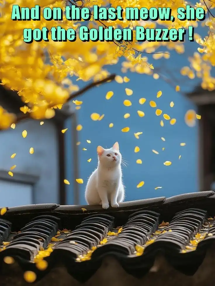 A white cat sits regally on a dark tiled roof as golden-yellow leaves fall around it against a blue sky. The overlaid text…