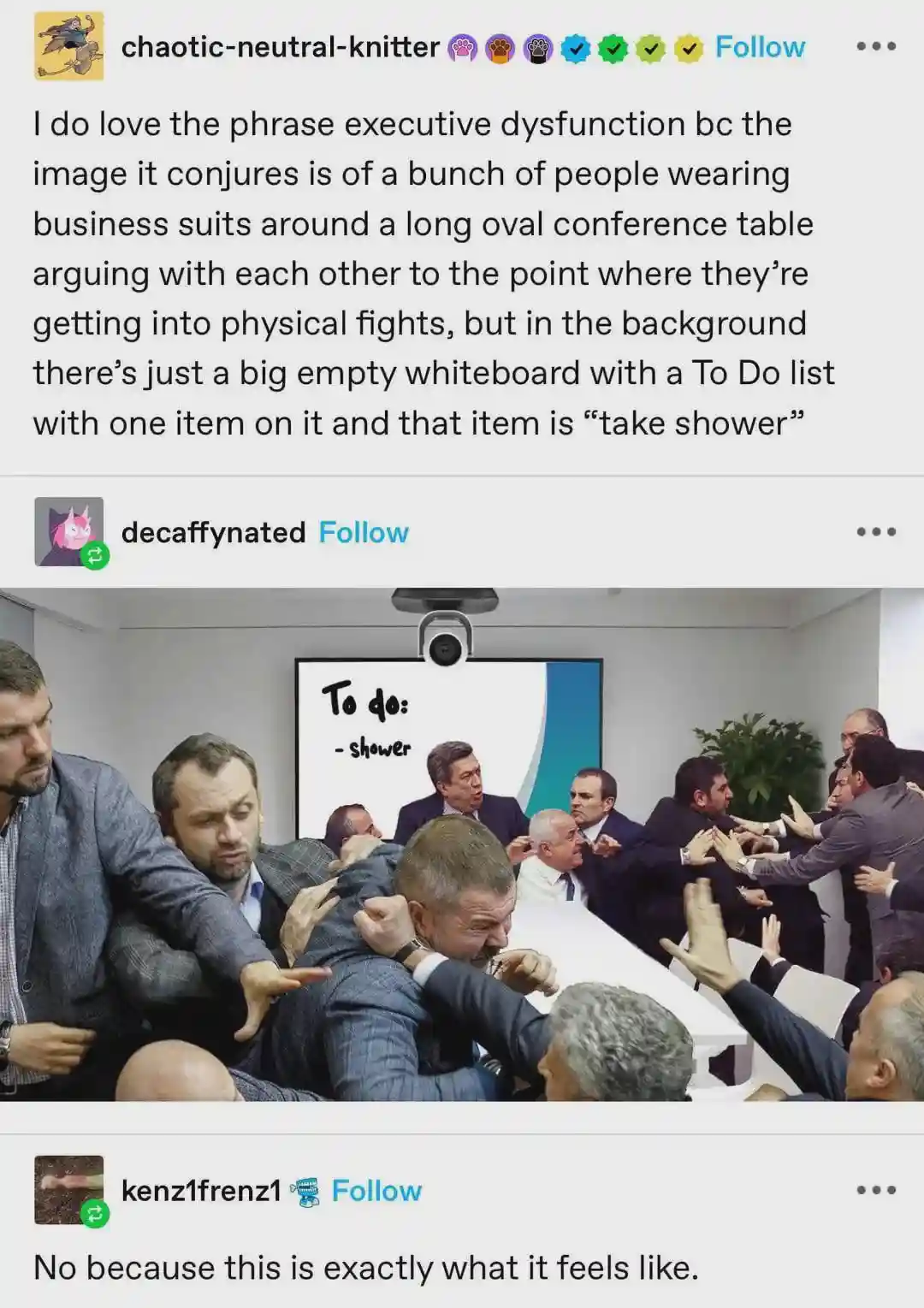 A group of men in business suits are physically fighting over a long white conference table. Behind them, a large whiteboard…