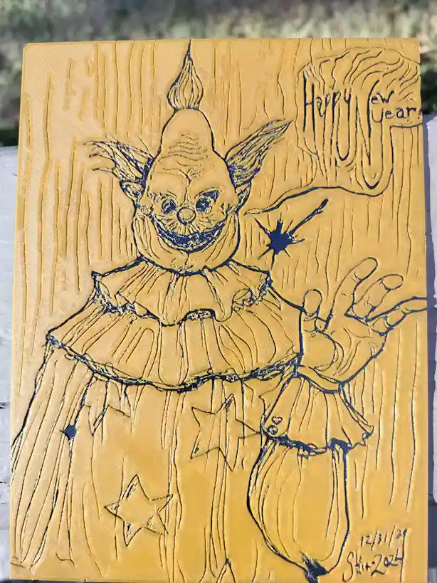 A yellow, textured relief artwork depicts a menacing clown with a wide, toothy grin, pointed hat, and ruffled collar, set…