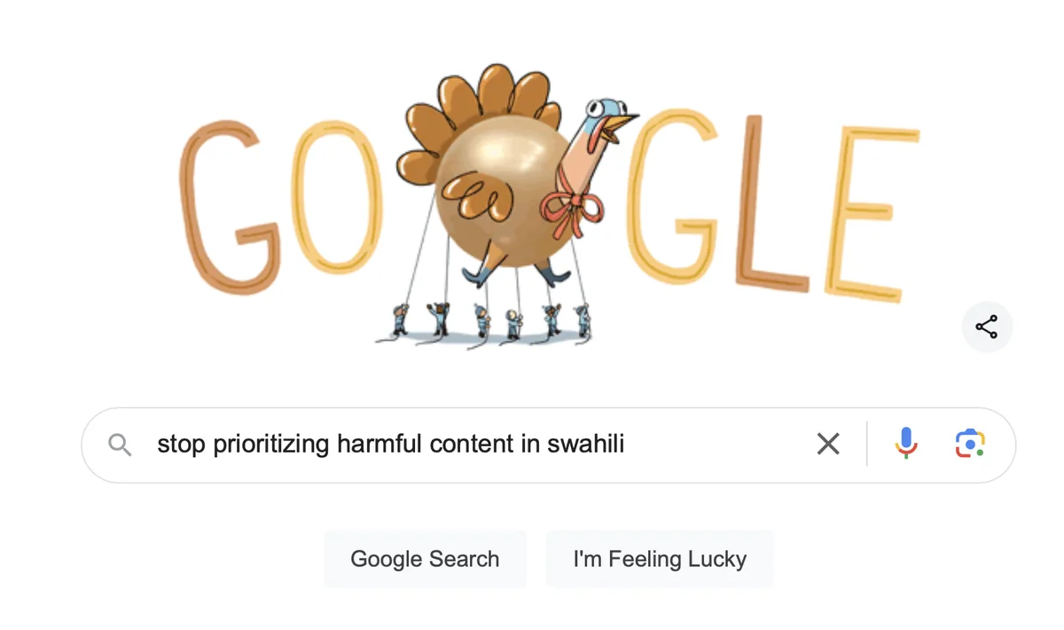 A Google Doodle featuring a cartoon turkey being puppeteered by tiny figures, with the search bar below containing the text…