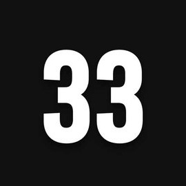 A stark black background features the number 33 in large, bold, white sans-serif font, centered and casting a subtle drop…