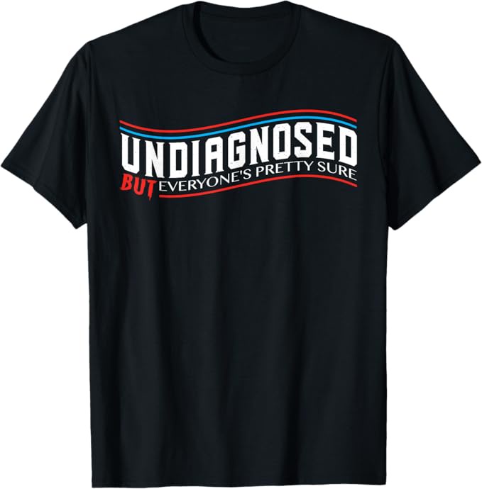 A black t-shirt displays bold white text reading 'UNDIAGNOSED' with 'BUT EVERYONE'S PRETTY SURE' in smaller red and white…