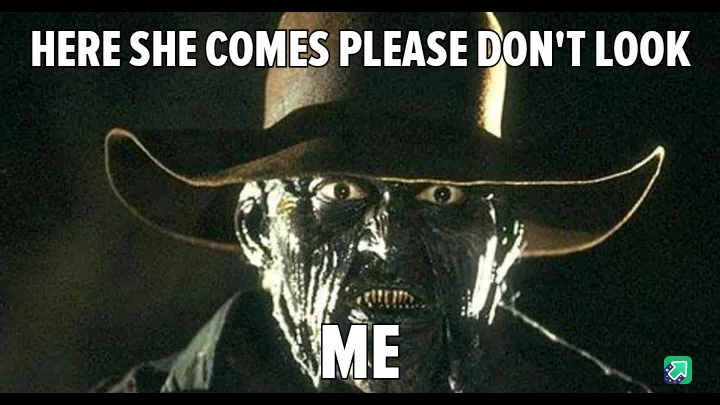 A close-up image of the horror character Freddy Krueger wearing his signature hat and burnt face, with wide eyes and a…