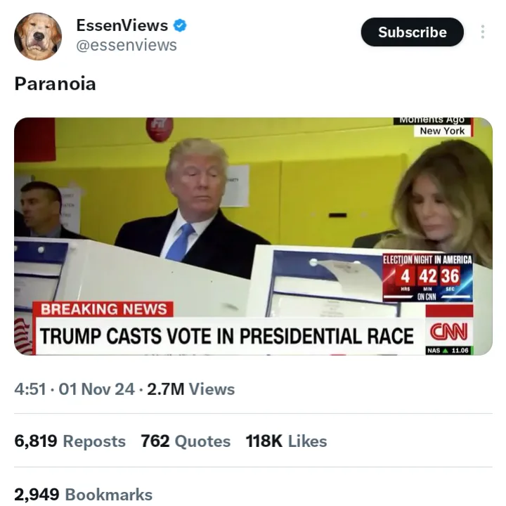 A screenshot from a CNN broadcast shows Donald Trump and Melania Trump at a voting booth, with a breaking news banner…