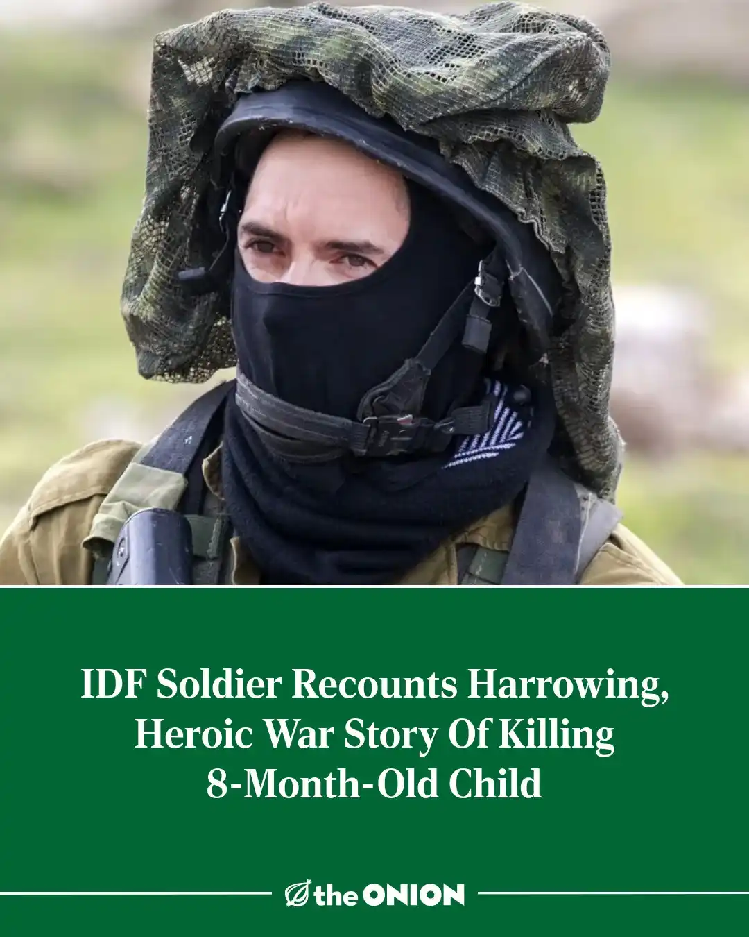 A soldier in military gear with a black balaclava and camouflage netting over their head, looking directly at the camera…