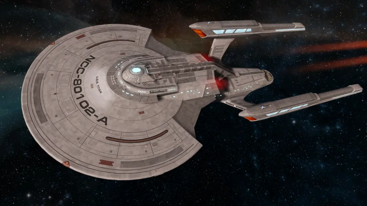 A gray Starfleet starship with the designation 'U.S.S. TITAN NCC-80102-A' visible on its saucer section, shown in space with…