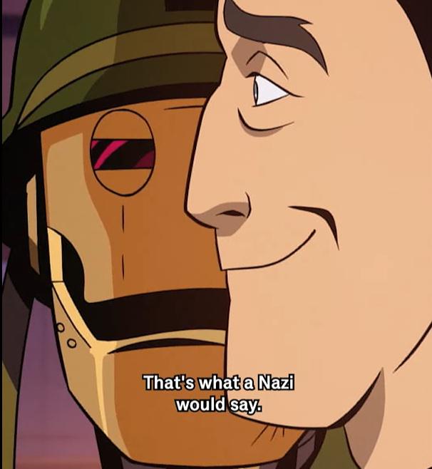 A close-up anime scene shows a man with a smug expression whispering to a robot with a helmet and one visible eye. The…