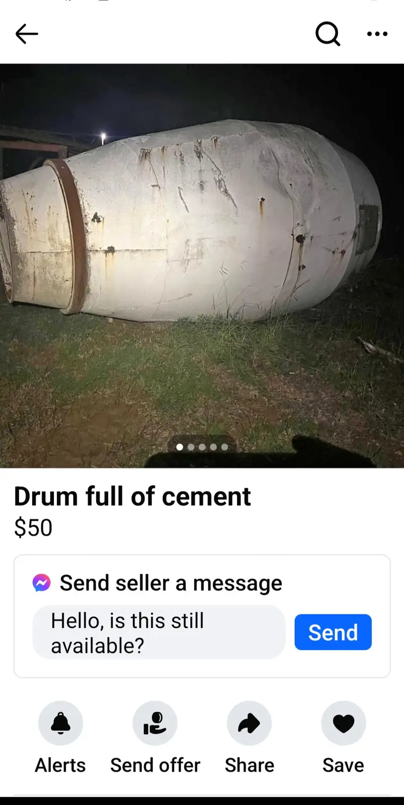 A screenshot of a marketplace listing shows a large, rusty, white cylindrical drum lying on grass at night. The listing text…