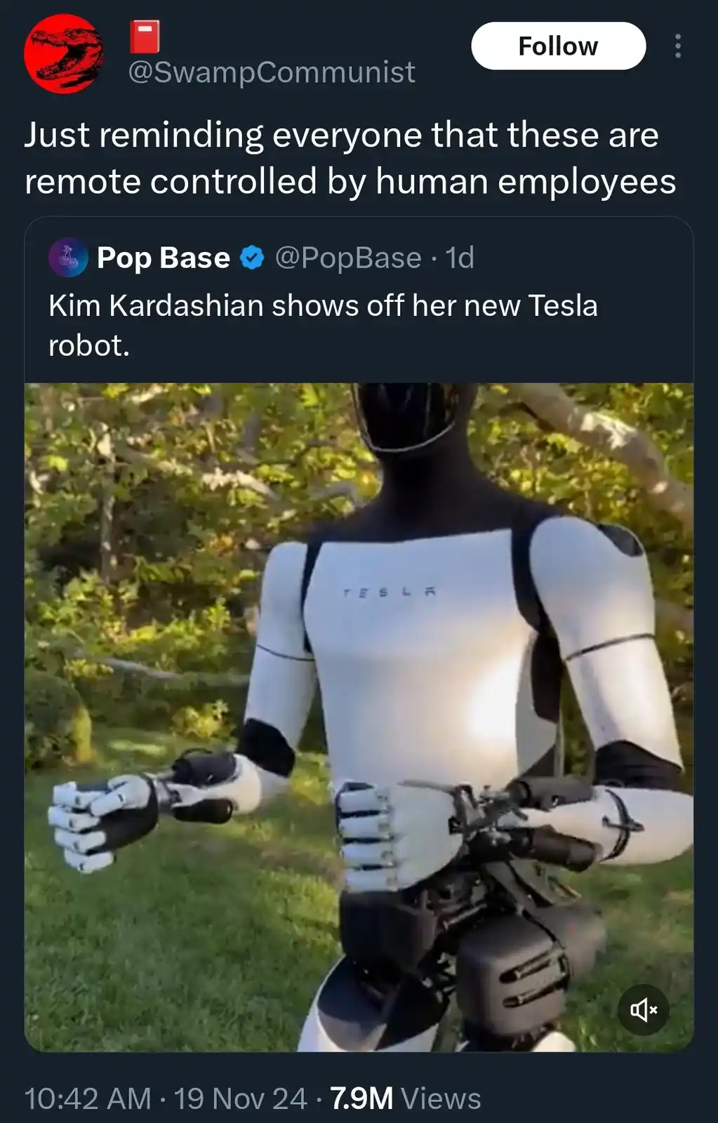 A screenshot of a social media post showing a humanoid robot with a white and black Tesla-branded torso standing outdoors on…