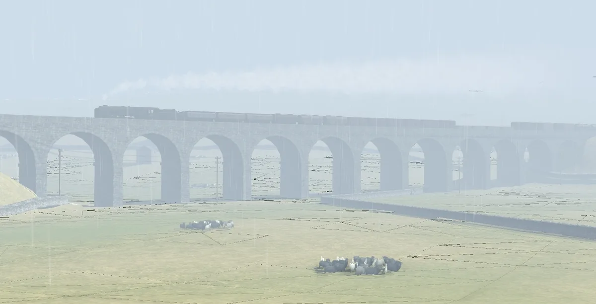 A desaturated, rainy image shows a long stone railway viaduct with a steam train passing over it, while two small flocks of…