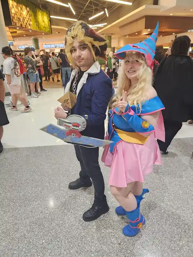 Yugi teams up with Dark Magician Girl for an epic showdown!