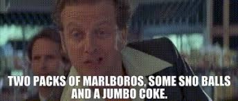 A man with wide eyes and an open mouth looks shocked or overwhelmed, overlaid with the text 'TWO PACKS OF MARLBOROS, SOME…