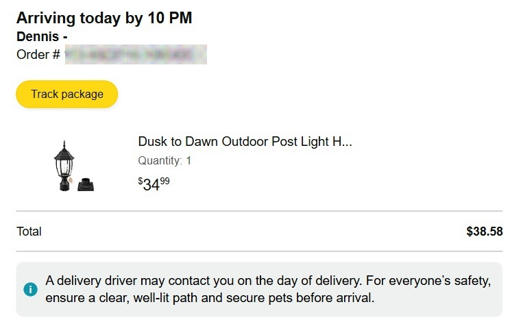 A screenshot of an online order confirmation for a 'Dusk to Dawn Outdoor Post Light' priced at $34.99, with a total of…