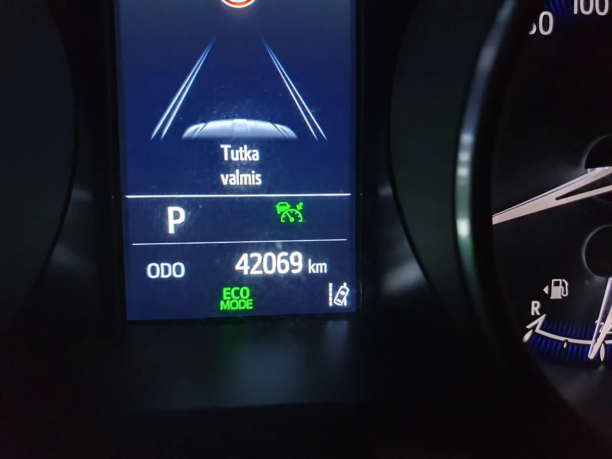 A close-up of a car's digital dashboard showing the text 'Tutka valmis' (Estonian for 'The car is ready') above the odometer…