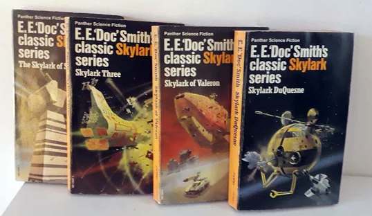 Four vintage paperback books from the 'E.E. Doc's classic Skylark series' are lined up, each with a different space-themed…