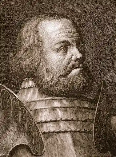 A vintage engraved portrait of a bearded man in ornate armor, looking upward and to the side, with the overlaid text 'i am…