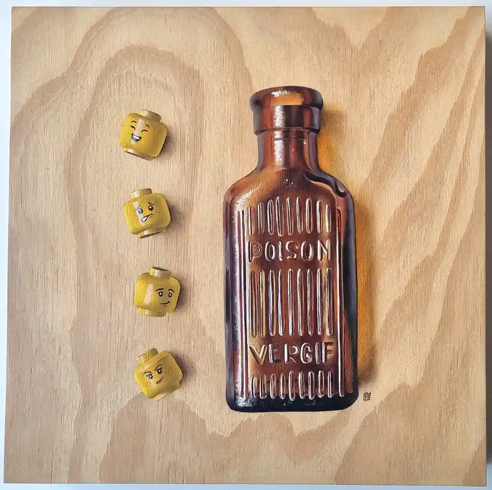 A painted wooden artwork shows a brown poison bottle labeled 'POISON VERGIF' next to four yellow Lego minifigure heads with…