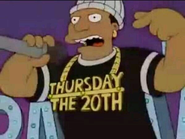 A cartoon character from The Simpsons, wearing a black t-shirt with 'THURSDAY THE 20TH' in yellow text, holds a microphone…