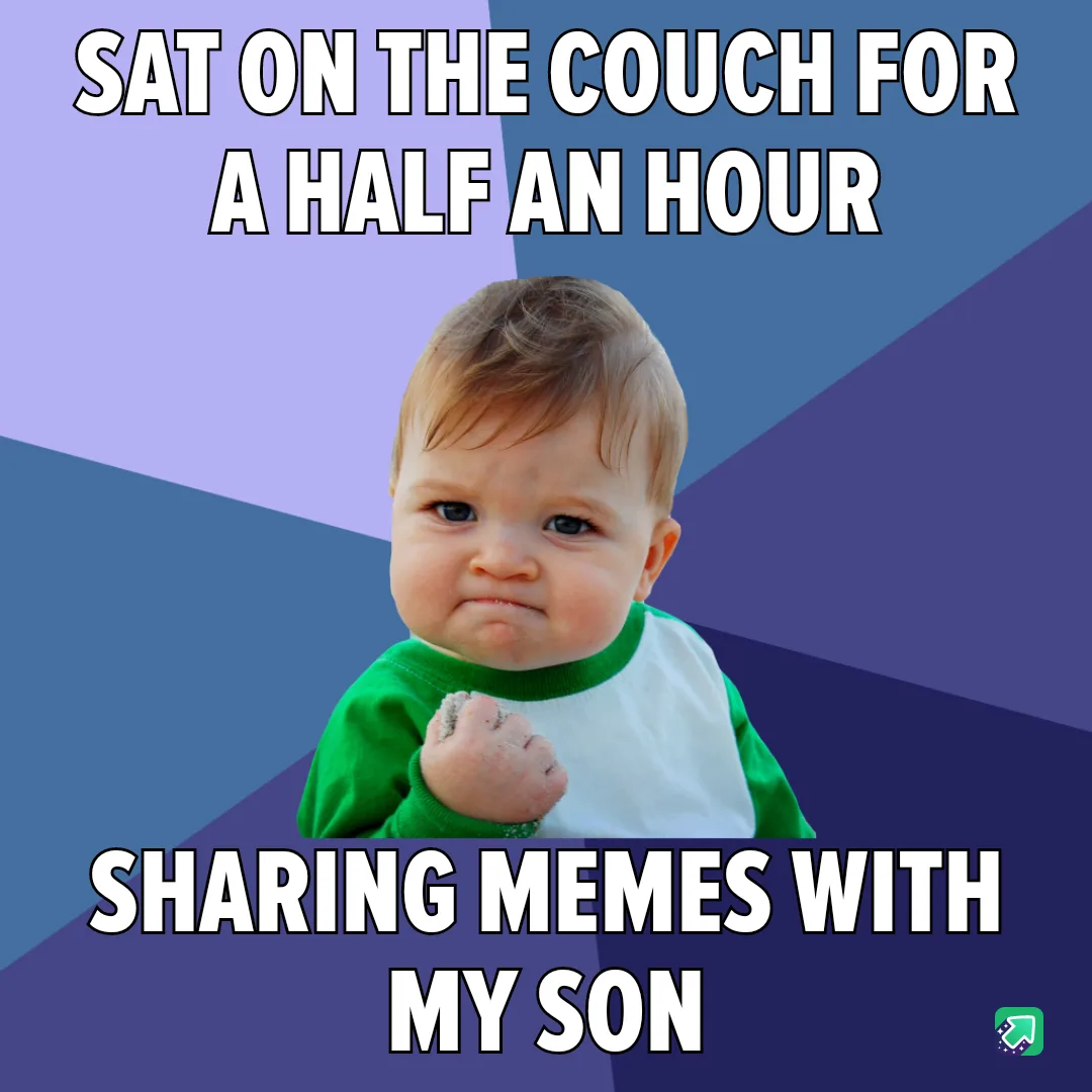 A baby with a scrunched-up face and clenched fist, wearing a green and white shirt, is centered against a geometric purple…