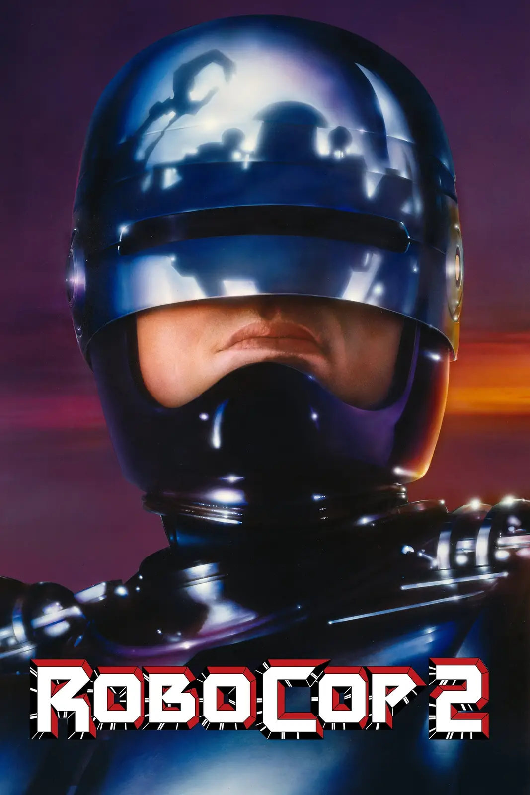 A close-up of the iconic RoboCop 2 movie poster featuring the cyborg's helmeted head with a visible human mouth and chin…