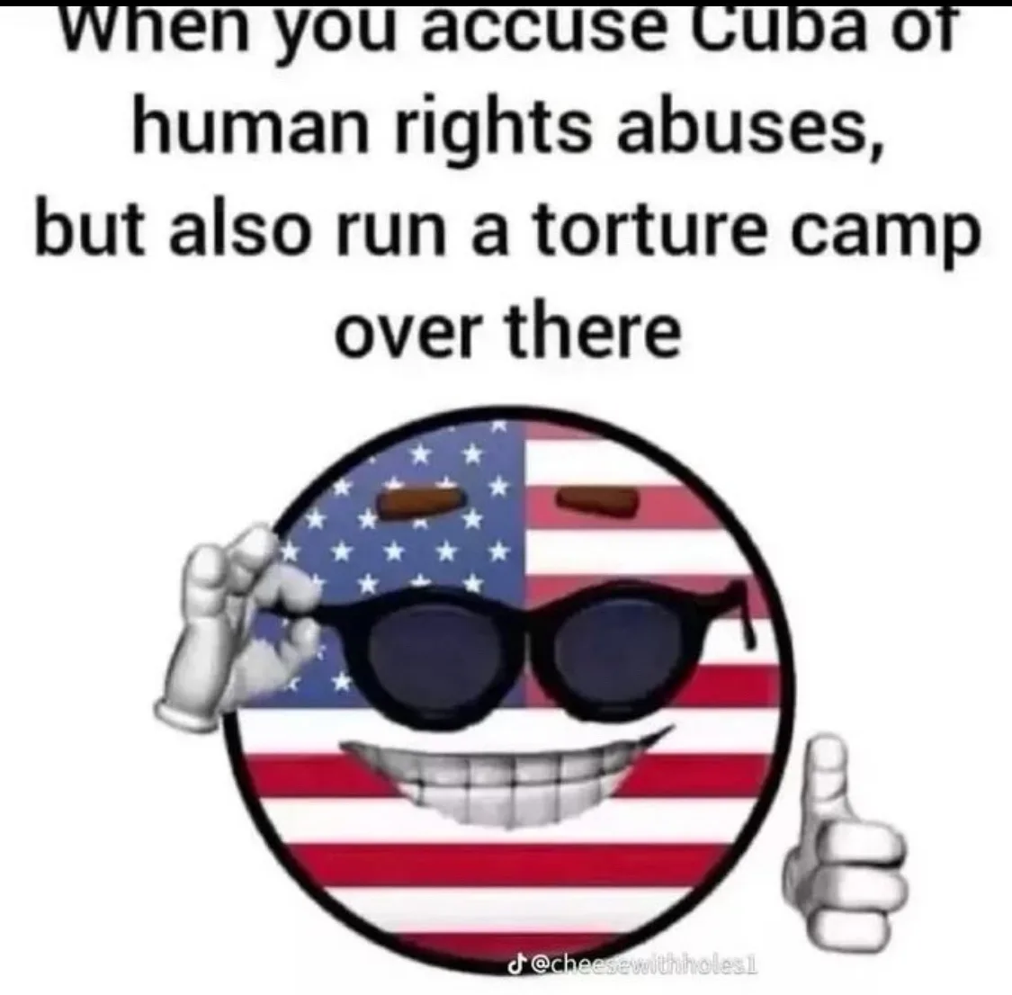 A cartoonish, smiling circle with the American flag pattern, wearing sunglasses and holding one hand up to the sunglasses…