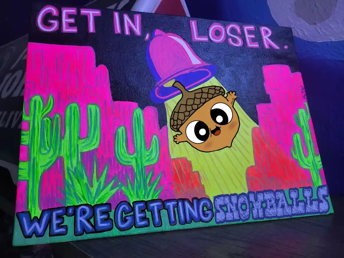 A hand-painted canvas depicts a cartoon acorn character wearing a pink bell hat, standing in a neon-pink desert with green…