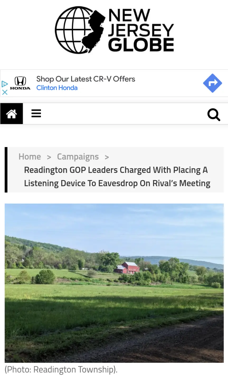 A screenshot of a New Jersey Globe news article shows a serene rural landscape with a red barn and green fields under a blue…