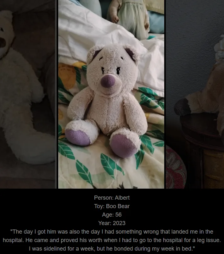 A light-colored plush teddy bear with purple feet and nose sits on a leaf-patterned bedspread. Below the image, text…