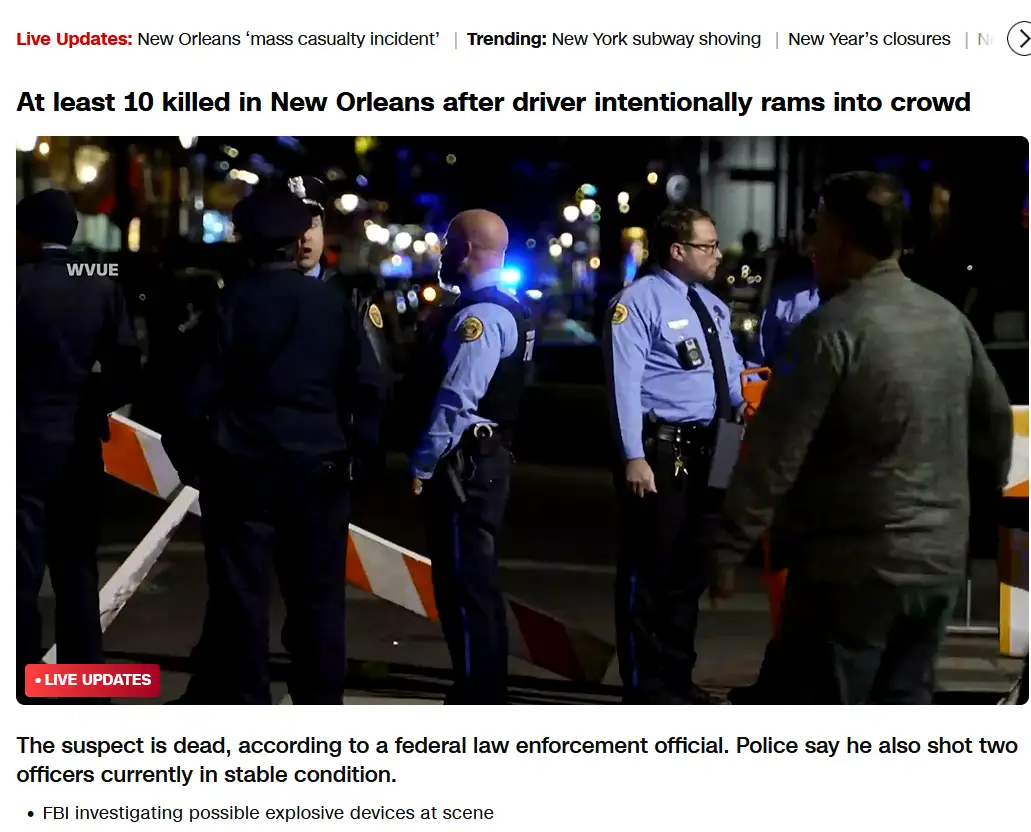 A screenshot of a news article about a mass casualty incident in New Orleans, showing police officers at night near…