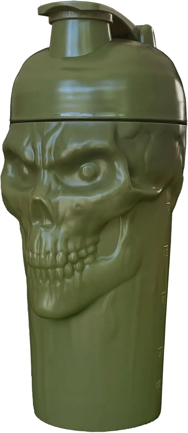 a green plastic shaker bottle shaped like a detailed, menacing human skull with visible eye sockets, nasal cavity, and…