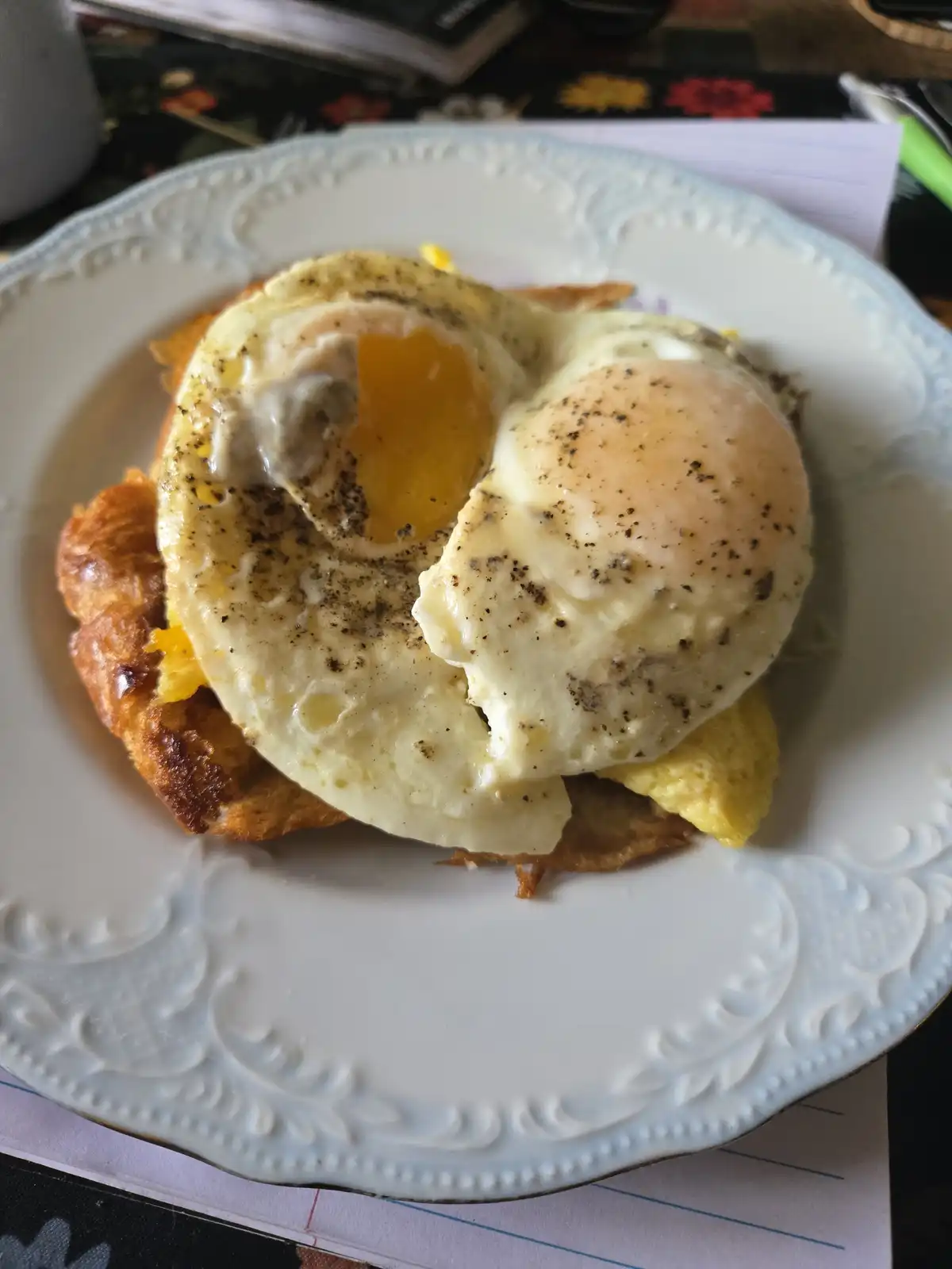 Breakfast Bliss: Leftover Sausage Croissant Sandwich with Extra Eggs, Knife and Fork Included!