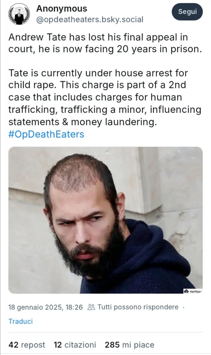A screenshot of a social media post showing a photo of Andrew Tate with a stern, skeptical expression. The overlaid text…