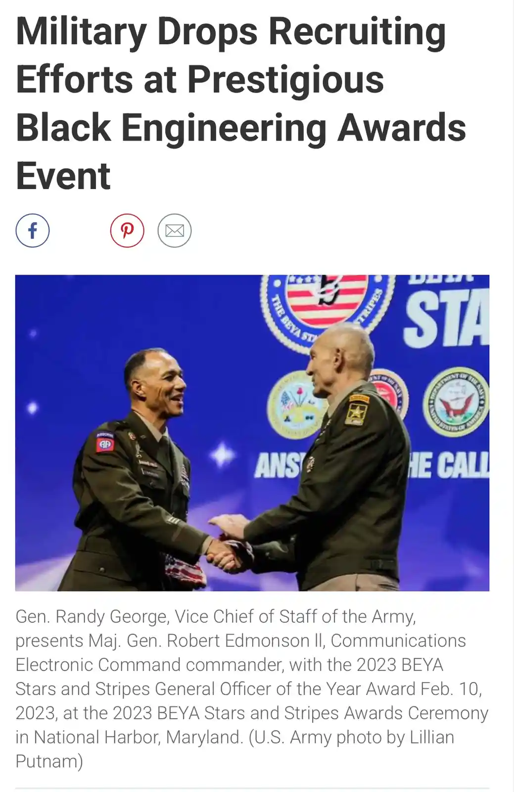 A photo shows two smiling military generals shaking hands on stage at the BEYA Stars and Stripes Awards Ceremony, with…