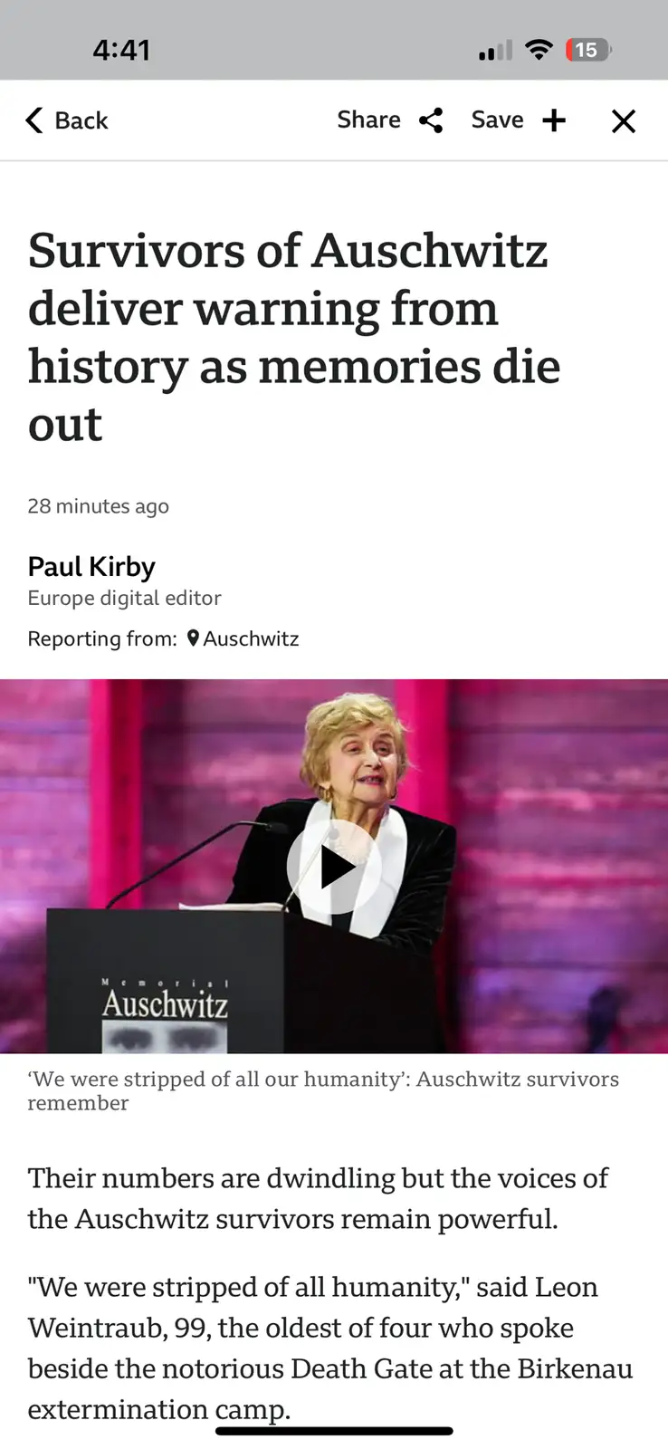 A screenshot of a news article about Auschwitz survivors speaking at a memorial, featuring a photo of an elderly woman at a…