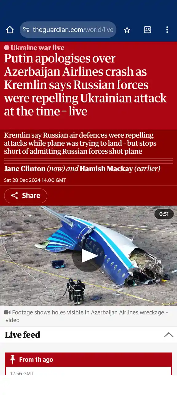 A screenshot of a The Guardian news article about the Azerbaijan Airlines crash, showing a wrecked blue and white airplane…