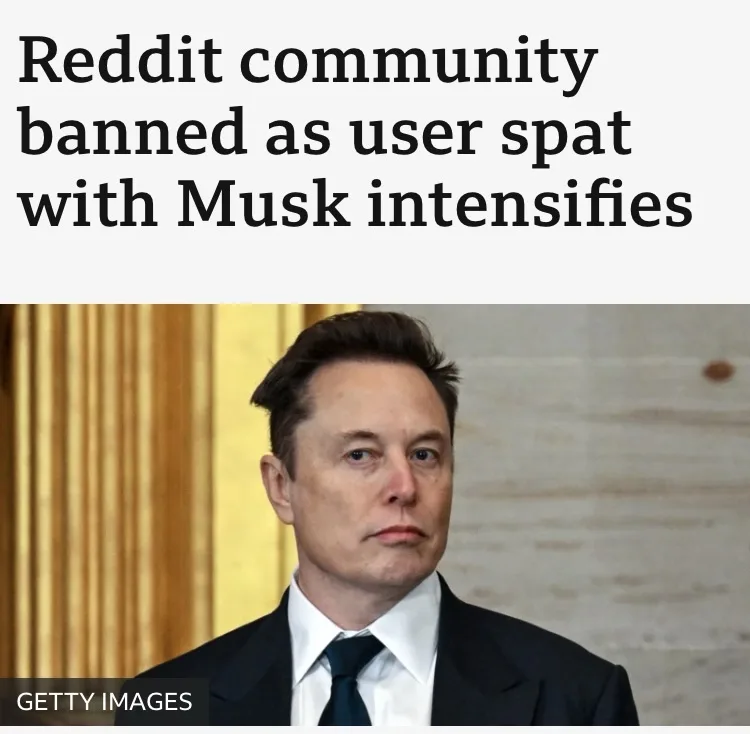 A photo of Elon Musk in a dark suit and tie, looking serious, with a gold column and light-colored wall behind him. The text…