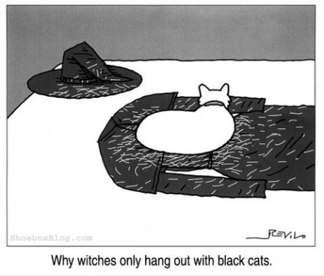 A black-and-white cartoon shows a white cat lying on a black, textured rug shaped like a witch's hat. A separate witch's hat…