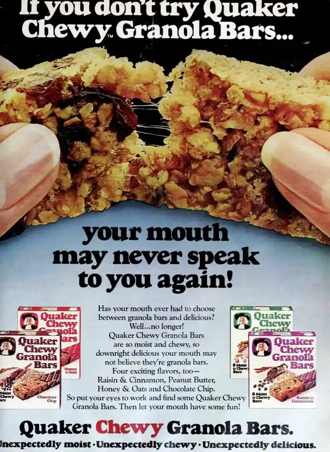 A vintage Quaker Chewy Granola Bars advertisement shows hands pulling apart a chewy bar, revealing its textured interior…